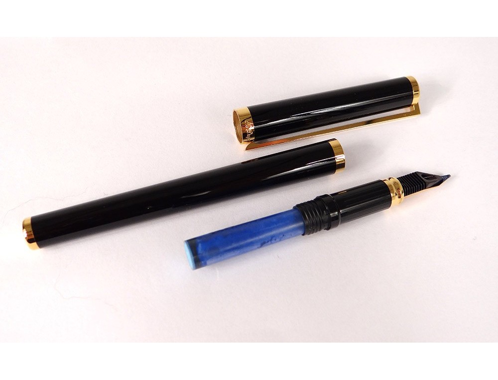 Set de deux stylos plume Vaccaro en métal doré et argent…
