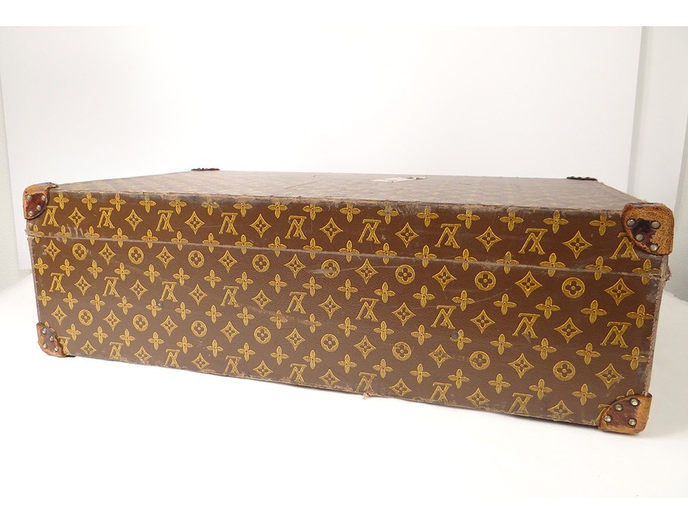 Louis Vuitton, a monogram canvas 'Pégase 60' suitcase, 2004. - Bukowskis