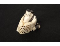 Netsuke Katabori ivory carved man basket Japan Meiji signed nineteenth century