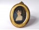 Small painted miniature oval portrait young woman bronze frame nineteenth century
