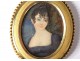 Small painted miniature oval portrait young woman bronze frame nineteenth century