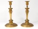 Pair candlesticks gilded bronze House Odiot lions palmettes nineteenth