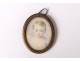 Small painted miniature oval pendant portrait young child nineteenth century