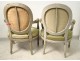 Pair Louis XVI cabriolet armchairs lacquered wood medallion stamp nineteenth