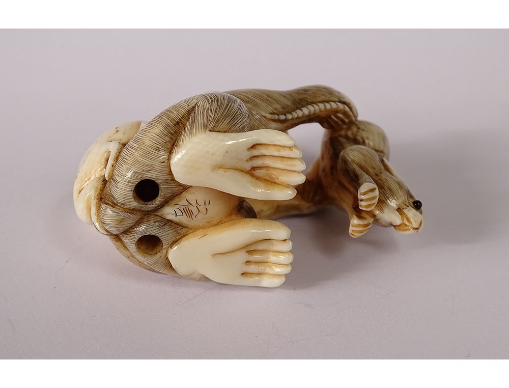 ivory monkey figurine
