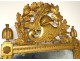 Large Revolutionary mirror in carved gilded wood helmet oak leaves eighteenth