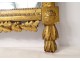 Large Revolutionary mirror in carved gilded wood helmet oak leaves eighteenth