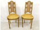 Pair of Louis XVI caned chairs carved gilded wood arrows knots late nineteenth