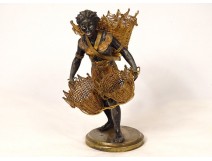 Trinket sculpture regulates black Nubian woman carrying baskets nineteenth