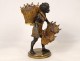 Trinket sculpture regulates black Nubian woman carrying baskets nineteenth