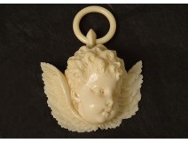 Small ivory Dieppe 19th century cradle angel head sculpture