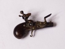 Small miniature percussion pistol with wood stock twentieth century