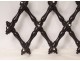 Wall-mounted folding coat rack in blackened wood Napoleon III XIXth century