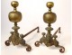 Pair of andirons called Aux Marmousets brass busts women XVIIth century