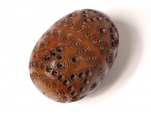 Nineteenth century sculpted corozo rosary case egg
