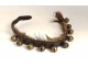 Old leather dog collar with metal bells from the 20th century