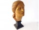 Head sculpture of a young woman in natural wood carved at the end of the 19th century