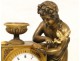 Gilt bronze clock in Love Shells, Empire, XIX