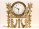 Gilt bronze clock signed in Paris Mynuel, Directoire period, eighteenth