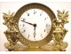 Gilt bronze clock signed in Paris Mynuel, Directoire period, eighteenth