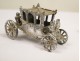 Tin miniature carriage with horses and riders painted nineteenth