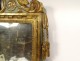 Miroir Louis XVI bois sculpté doré fronton rubans fleurs noeud glace XVIIIè