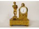 Clock gilt bronze cherub Cupid torch quiver rosette XIXth century