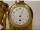 Clock gilt bronze cherub Cupid torch quiver rosette XIXth century
