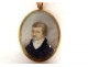 Painted miniature portrait of notable man oval frame work hair 19th century