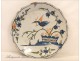 Lovely dish earthenware Rochelle, decorated with a bird among flowering branches, antique eighteenth century.