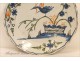Lovely dish earthenware Rochelle, decorated with a bird among flowering branches, antique eighteenth century.