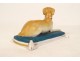 Small polychrome biscuit statuette sculpture lying dog early 20th century