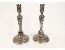 Pair of Louis XVI candlesticks, silvered bronze torches, 18th century garlands