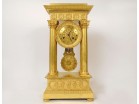 Grande pendule portique régulateur bronze doré colonnes Ier Empire XIXème