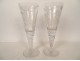 Pair of large crystal wedding stemmed glasses engraved with a vine monogram, 19th century