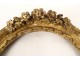 Small oval carved wooden frame with gilded flower, 18th century