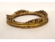 Small oval carved wooden frame with gilded flower, 18th century