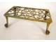 Gilded brass trivet support with claw feet, 18th century
