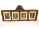 Carved wooden frame with coat of arms, quartered North Flanders, 19th century engravings