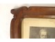 Carved wooden frame with coat of arms, quartered North Flanders, 19th century engravings
