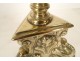 Pair of twisted bronze candlesticks with cherubic marmosets, 17th century