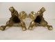Pair of twisted bronze candlesticks with cherubic marmosets, 17th century
