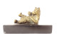 Gilded bronze paperweight sculpture of a reclining bear in black marble, 19th century