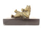 Gilded bronze paperweight sculpture of a reclining bear in black marble, 19th century