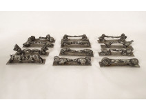 12 pewter knife rests, Art Deco animals, squirrels, monkeys, roosters, 20th century
