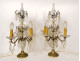 Pair of 4-light gilt bronze chandeliers with cut crystal and tassels, late 19th century