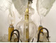 Pair of 4-light gilt bronze chandeliers with cut crystal and tassels, late 19th century