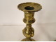 Pair of Louis XV bronze candlesticks, torches, flowers, garlands, 18th century