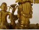 Small clock with gilded bronze gardener watering can column Berthoud Paris 19th