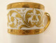 Porcelain cup and saucer Paris Le Tallec with gilded arabesques and foliage, 20th century